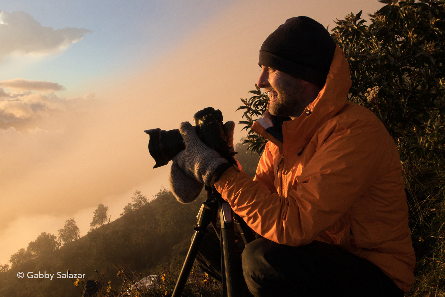 Ross, taking shots of the active lava dome from the summit of Volcán Santa Maria.